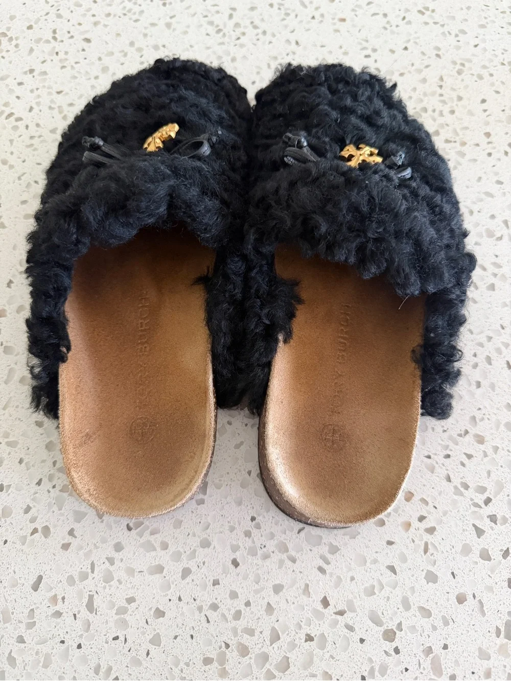 Tory Burch Women’s Black Faux-Shearling Slip-On Mules with Gold Logo